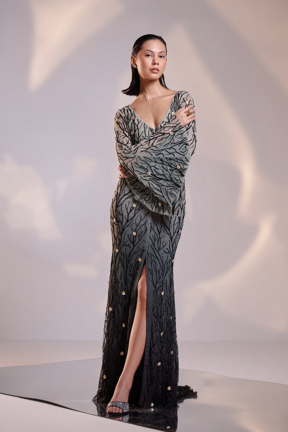 Elegant Black V Neck Ombre Gown with Flared Sleeves Featuring Intricate Hand Beading and a Sweeping Trail