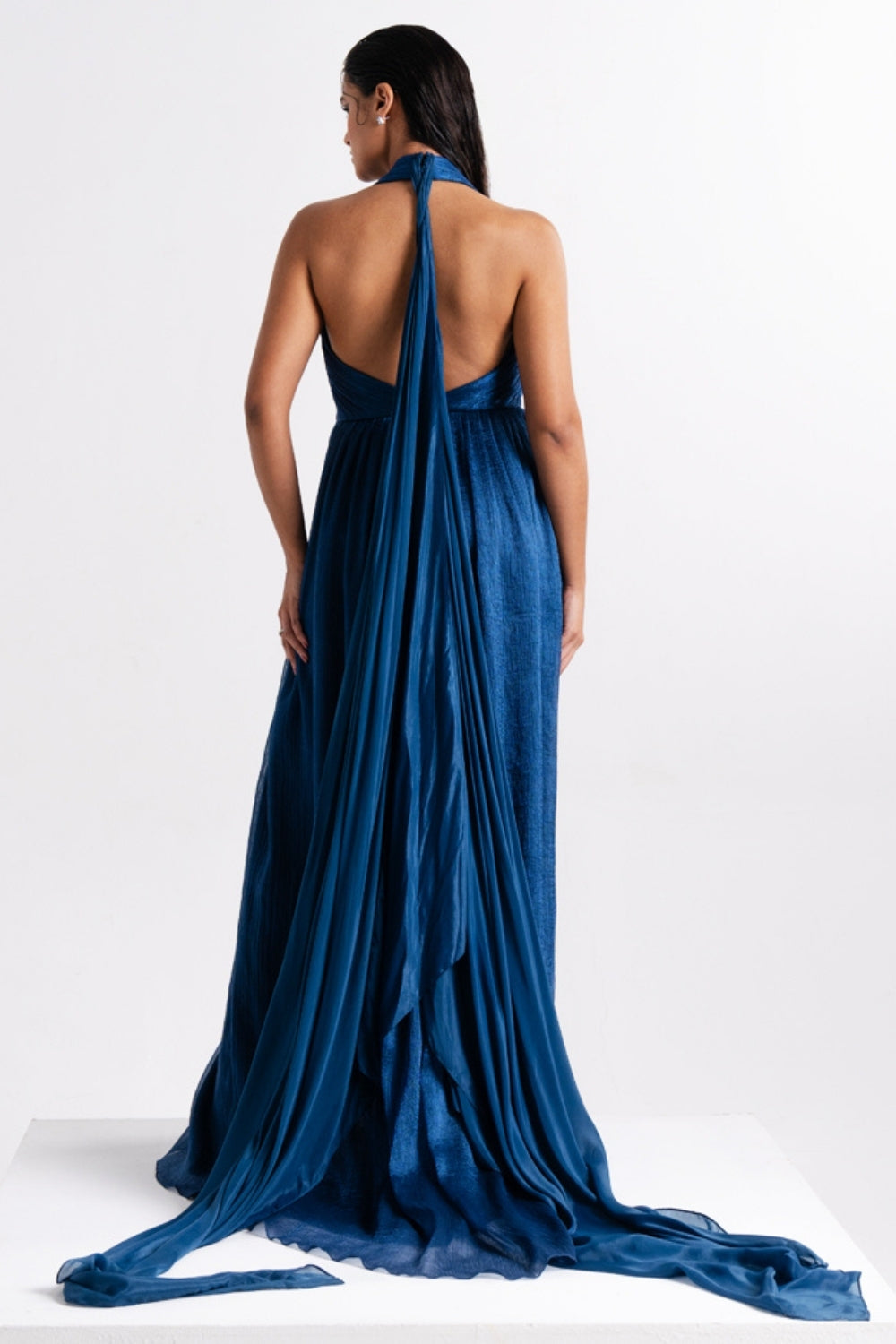 Sapphire Blue Draped Halter Neck Gown with Flowing Trail