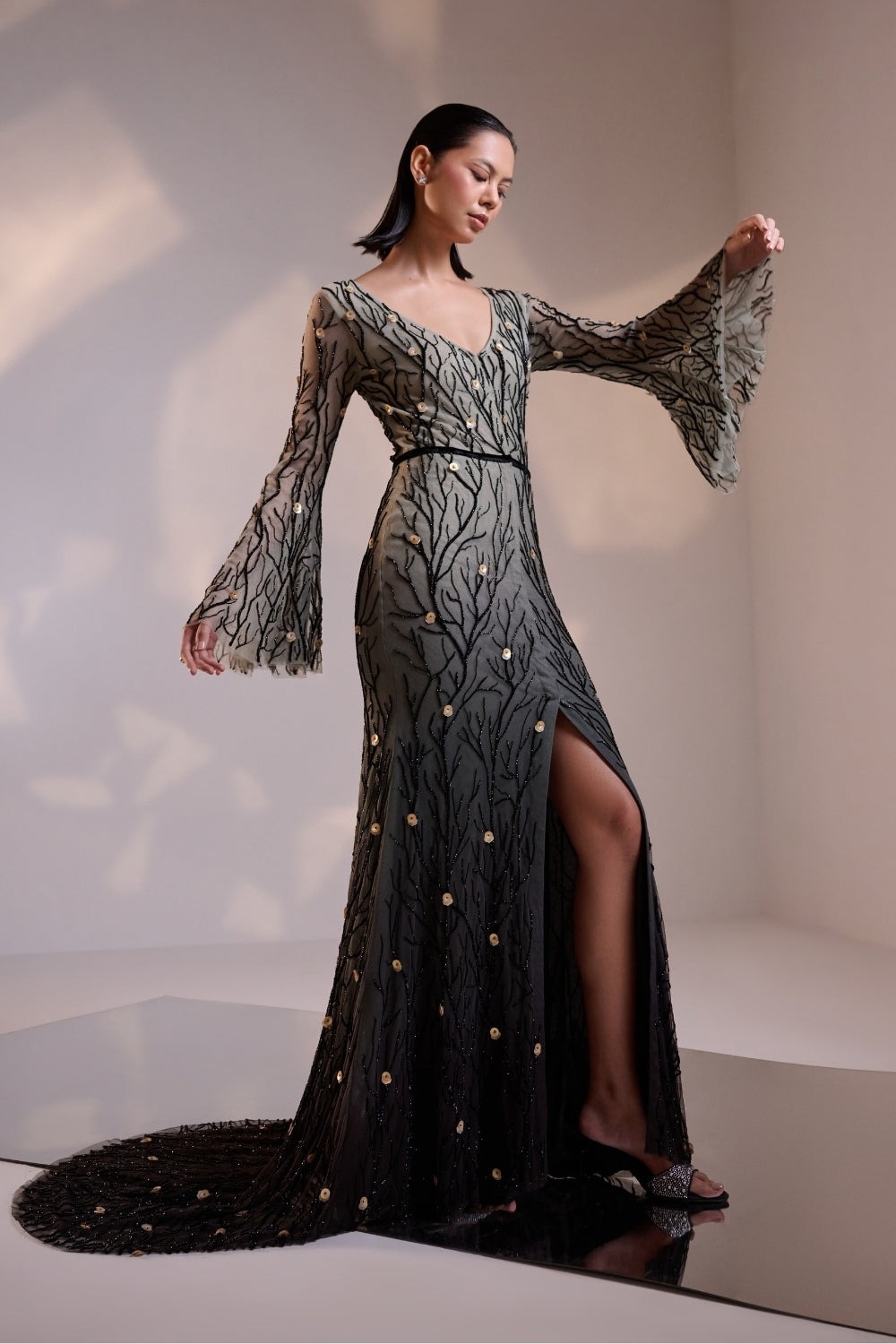 Elegant Black V Neck Ombre Gown with Flared Sleeves Featuring Intricate Hand Beading and a Sweeping Trail