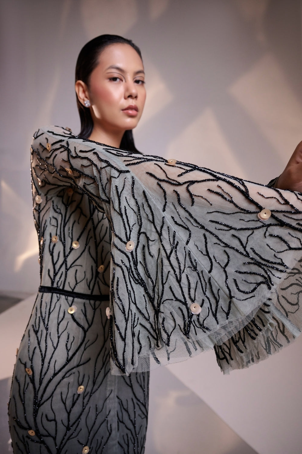 Elegant Black V Neck Ombre Gown with Flared Sleeves Featuring Intricate Hand Beading and a Sweeping Trail