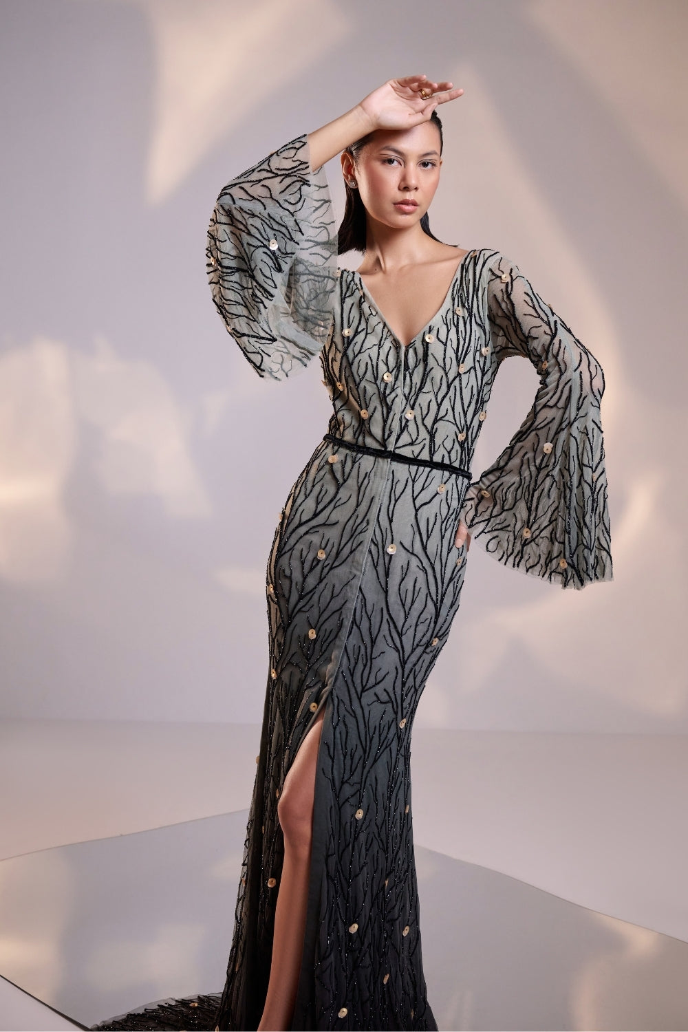 Elegant Black V Neck Ombre Gown with Flared Sleeves Featuring Intricate Hand Beading and a Sweeping Trail